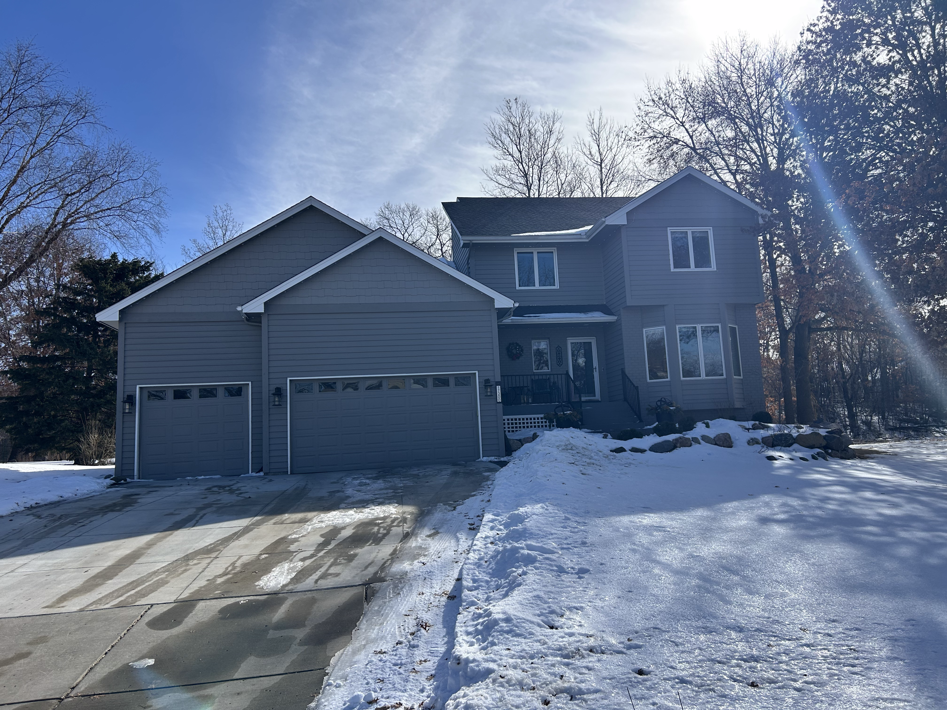 Home exterior during the day — permanent lights invisible